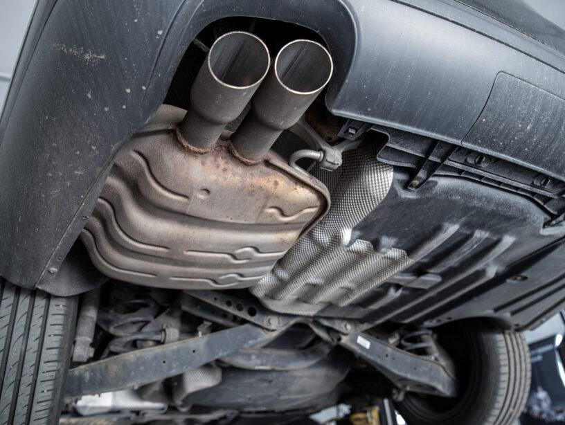 Close-up detail bottom view of car part metal exhaust Exhausts Newcastle under Lyme