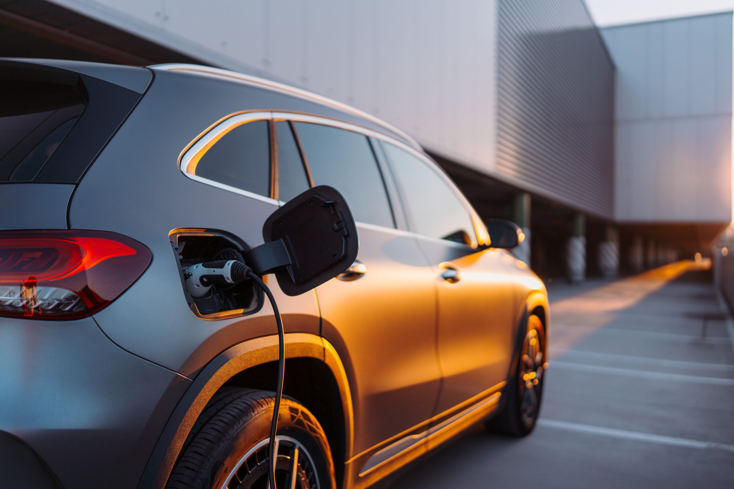 Close-up of electric car charging, concept of ecology transportation.
